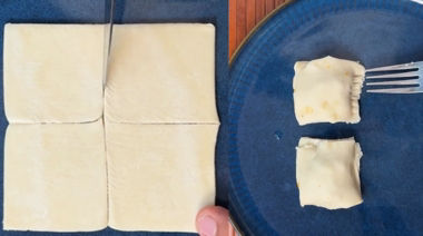 Golden puff pastry bites stuffed with Schezwan chicken and cheese filling